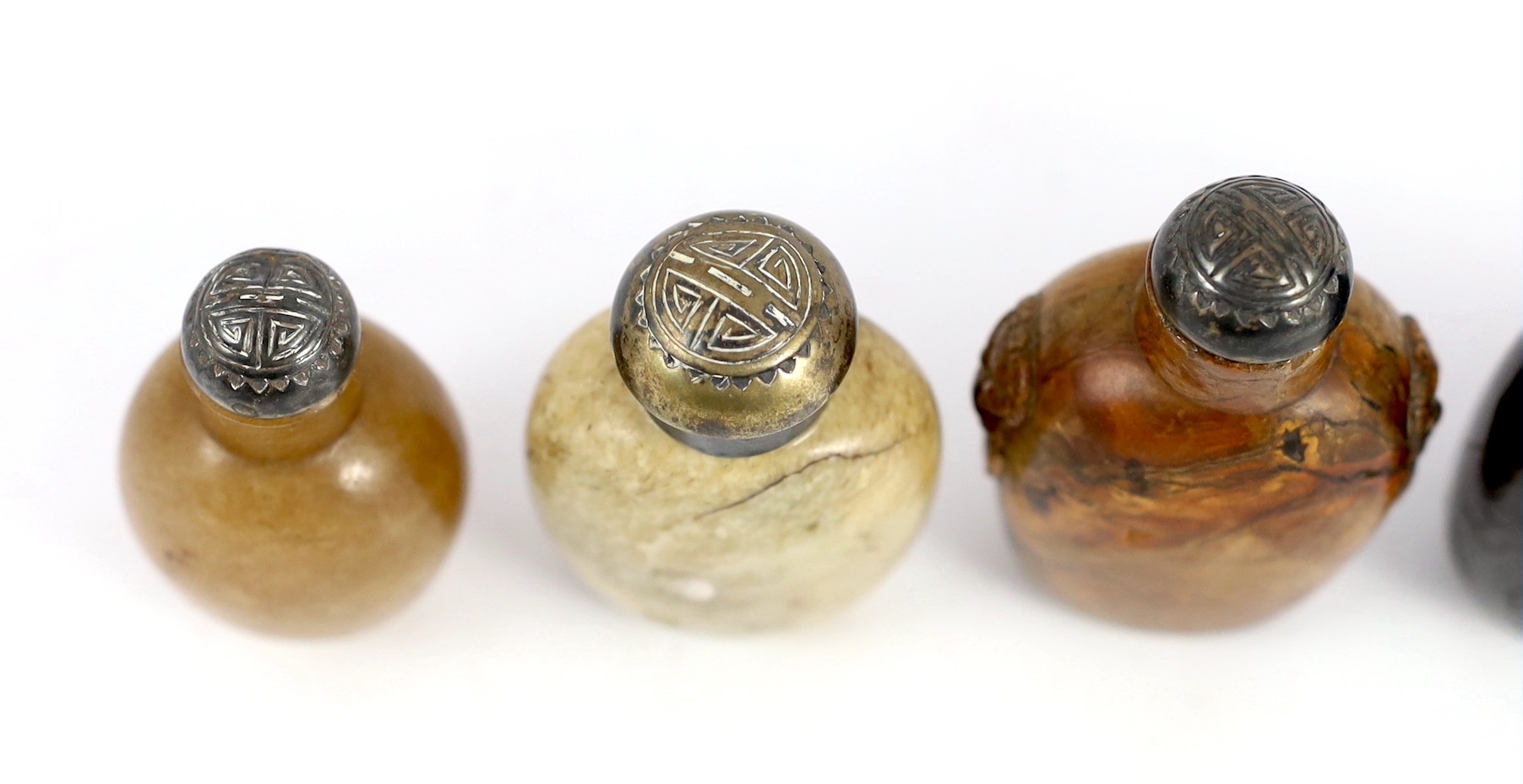 A scholarly collection of six 19th century Chinese snuff bottles, some faults
